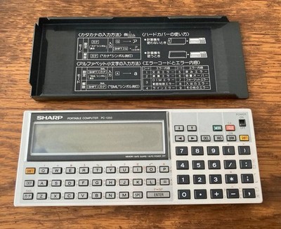 Sharp PC-1350 Pocket Computer with defects black LCD leak used