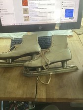 Vintage Sonja Henie skates with veg printed auto photo