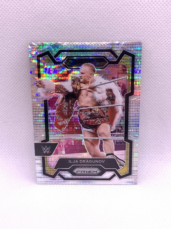 2024 Panini Prizm WWE, Ilja Dragunov Pulsar Prizm #'D /499, #184, Near MInt/Mint