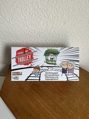 Trial by Trolley Partyspiel schwarzer Humor moralischen Dilemma Spiel Skybound