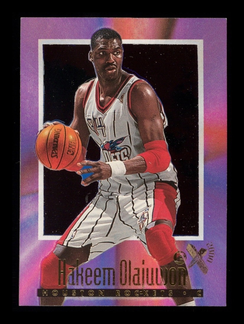 1996-97 Fleer eX2000: # 25 Hakeem Olajuwon Purple Refractor NR-MINT