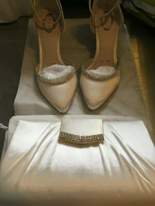 gold satin shoes and bag