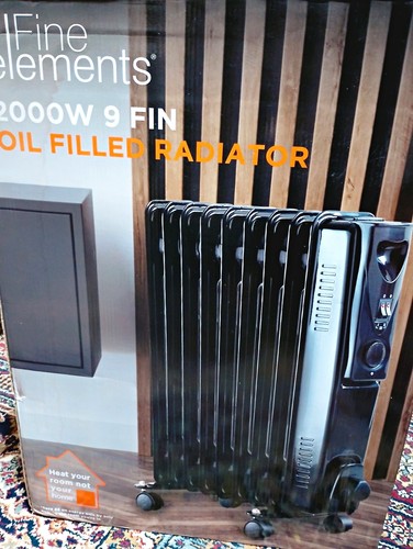 Fine Elements 2000W 9 Fin Oil Filled Radiator Black Wheels Rotary Dial 3 Heat
