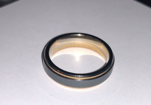 used (trade-in) TUNGSTEN sz 9 gold-tone gray accent RING cannot be sized. Fine.