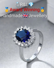 Size P-Q; White Gold*Woman Ring.Oval Lab Created Blue,White Surrounding Sapphire