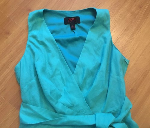 Sommerkleid grün ärmellos mit Bindeband voller Rock V-Ausschnitt Wickeloptik Größe 4 gebraucht - Bild 2 von 11