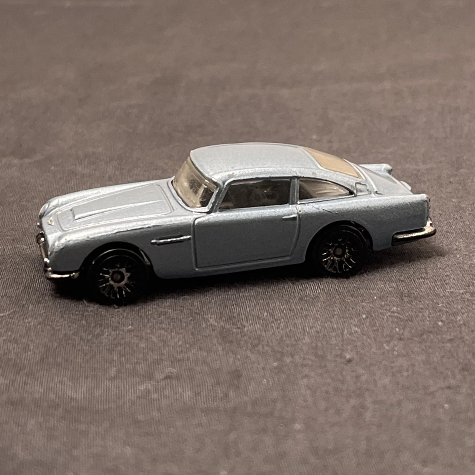 2013 Hot Wheels 007 SKYFALL James Bond Aston Martin 1963 D85 carro de brinquedo fundido ~GF - Imagem 3 de 4