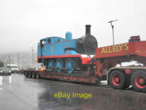 Photo 6x4 Thomas the Tank engine says goodbye to Minehead Leaving on a ra c2015 - Picture 1 of 1