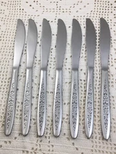 7 Customcraft Stainless Taiwan CUS5 Solid Dinner Knives 8 1/4" Floral Textured