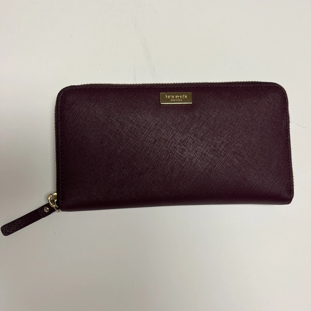 Plum kate spade wallet hotsell