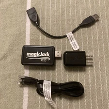 MagicJack K1103 Unit with Ethernet Cord and USB extender cord and AC Adapter 