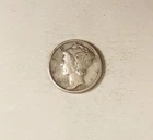 1923-S Mercury Silver Dime grades VF, A Few Small Surface Marks.