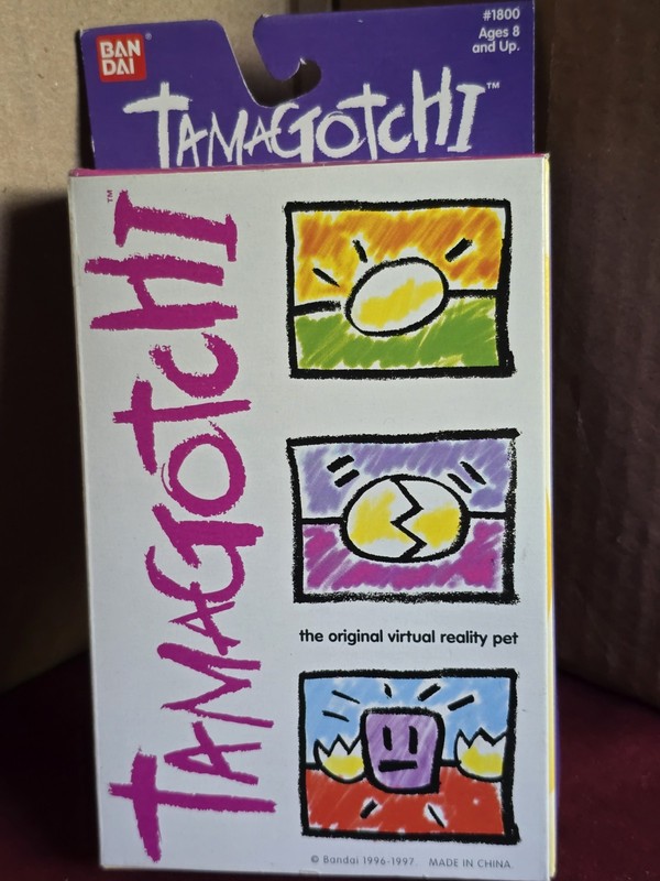 BANDAI TAMAGOTCHI 1997 version #1800 Green with Yellow, new sealed box