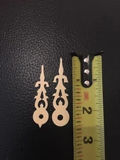 Large Cuckoo Clock Hands (D) 2 1/4 Center Hole Minute Hands. Plastic-color bone.