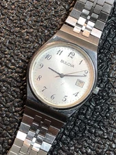 Vintage Bulova Swiss Movement 34mm Watch Silver Tone For Parts Or Repair