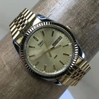 Vintage Timex Men Fashion Fluted Bezel Gold Tone Quartz Analog 33mm Watch 7 1/2"