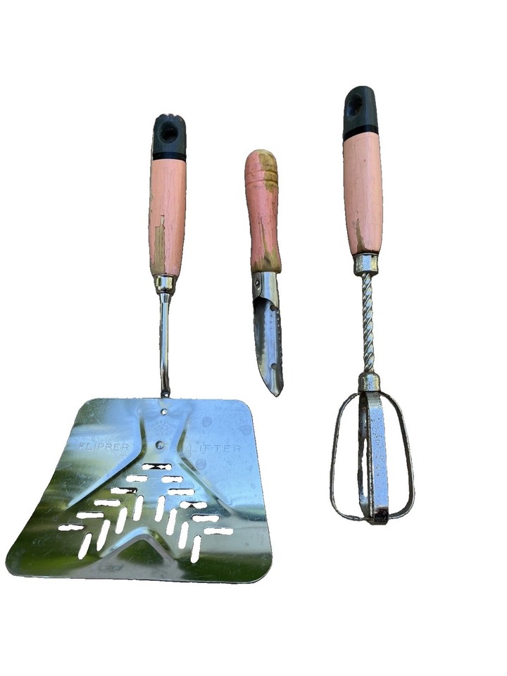 A trio of vintage EKCO utensils in rare *pink* wooden handles — the color alone makes this a retro kitchen showstopper.