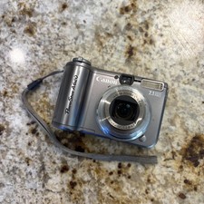 Canon PowerShot A620 7.1MP 4x Zoom Silver Digital Camera. WORKING.