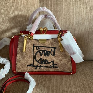 coach kisslock dreamer 21 in signature canvas