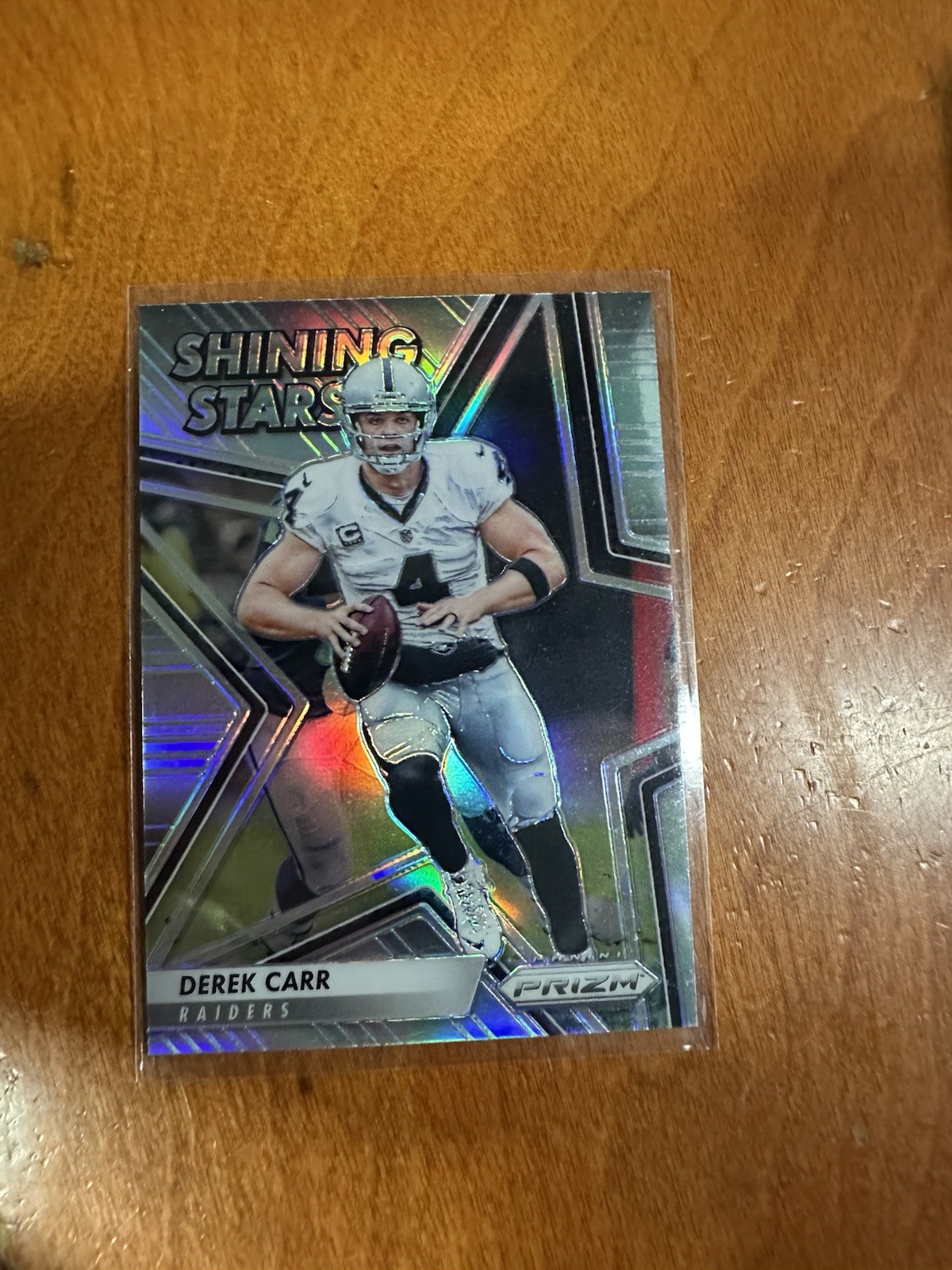 (B) 2016 Panini Prizm Shining Stars Prizms Green #24 Derek Carr RAIDERS