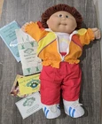 1982 Cabbage Patch Kids Brown Haired Boy Doll with Outfit and Birth Certificate