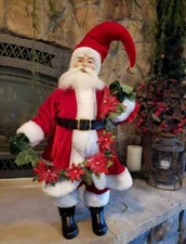NWT Large 25" Santa holding Poinsettia Garland Christmas Figure Display Prop