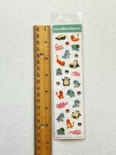 Pok mon stickers featuring Charmander, Squirtle, Bulbasaur, Snorlax, Slowpoke