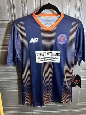 Brandneu mit Etikett New Balance FTC Fußball Trikot Nr 21 orange/marine Größe Young XLarge 14-15y