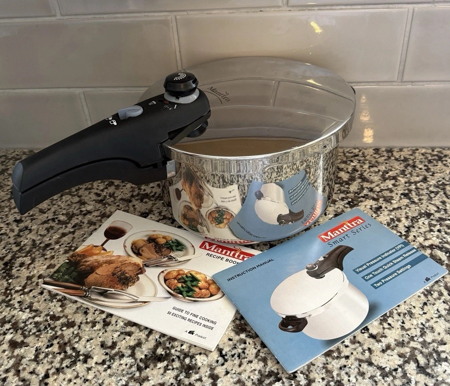 Manttra Stainless Steel 6Qt Pressure with directions and recipe book