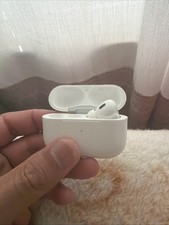 Original MagSafe Charging Case and Right AirPod Pro 2nd Gen earbud.