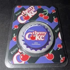 Coca-Cola 1 oz Silver Colorized Round Cherry Coke in TEP packaging