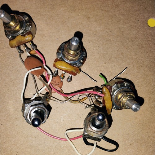 Potentiometers  and switches from a 80's Peavey Horizon 11