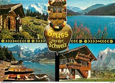 Carte Postale - Suisse - Autre - Multivues - Chalet Suisse en bois - Joueur de c