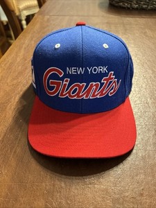 NEW YORK GIANTS LOT MITCHELL/NESS HAT EAR WARMERS & PINS