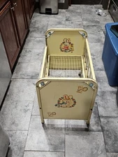 Vintage Amsco Cream Colored Metal Doll E Crib Wooden Wheels Bunny rabbit Decals.