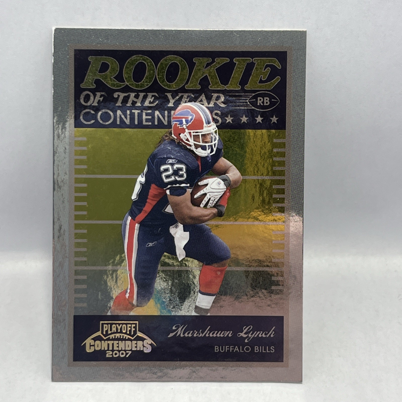 Marshawn Lynch Playoff Contenders Rookie of the Year Contenders #ROY23 Gold Holofoil