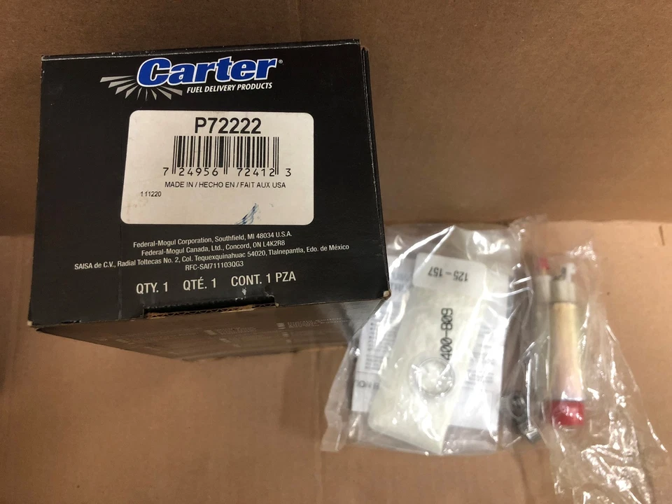Un juego de bomba de combustible y filtro genuino Carter P72222 Foto 3 de 3