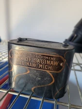 Bank of Saginaw coin bank.  Bronze, good condition.