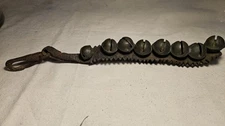 8 Antique Brass Sleigh Bells on Leather Strap 1.5 in Wide BY 13.75" Long