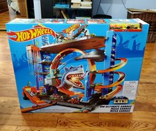 hot wheels ultimate garage tower shark loop racetrack set with two vehicles