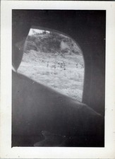 WW2 Photo of Soldiers Marching on Hillside Seen from Vehicle