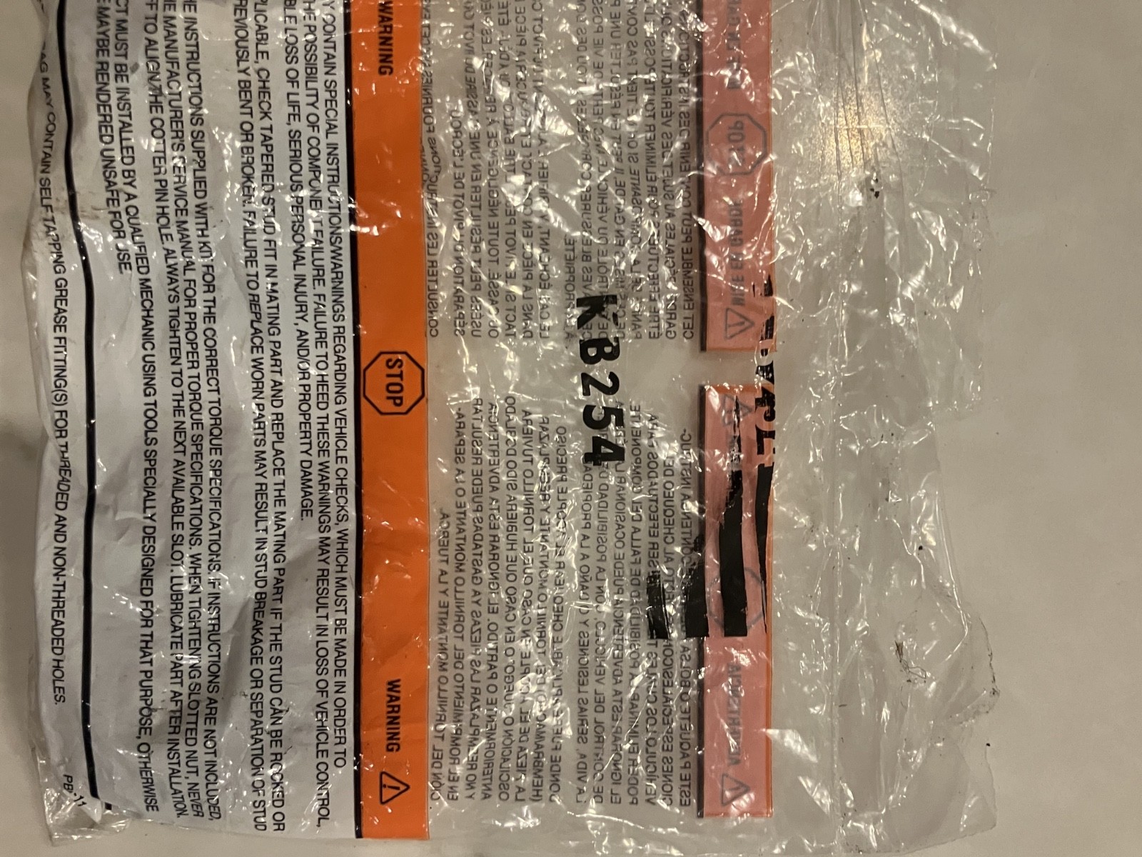 Lower control arms 1967 Ford Mustang with metal roller, black NOS MOOG K8121, made in USA, in clear packaging.