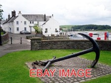 PHOTO  OLD ANCHOR BY THE HARBOUR THE WHITE BUILDINGS ARE AT CASTLE BANK. THE COR