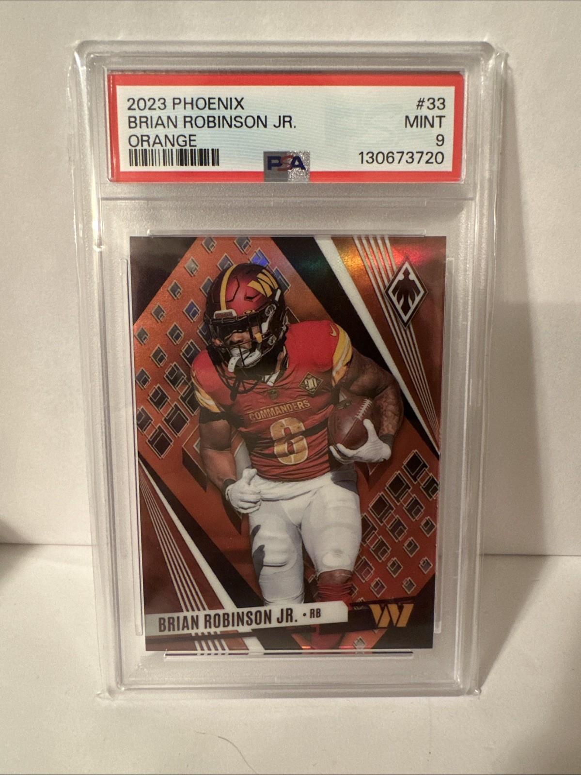 2023 Panini Phoenix - Brian Robinson Jr. #33 Orange /75