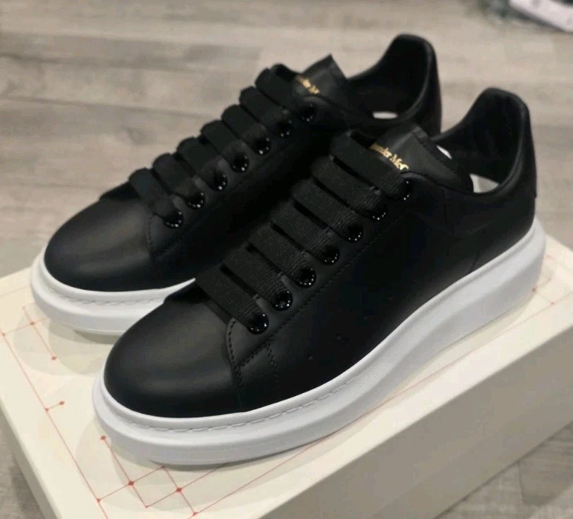 Alexander McQueen — Alexander McQueen Men's Oversized Larry Black Leather Sneakers, Size 9US