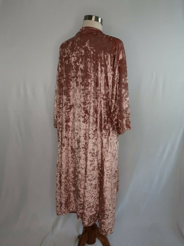 Rose gold pink velvet cover up jacket with long sleeves and back, displayed on mannequin against plain white background.
