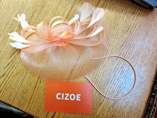 HAT FASCINATOR-KENTUKY DERBY- PEACH CHAMPAGNE W FEATHERS RIBBONS-COZIE-NIB
