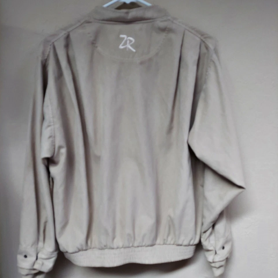 Prendas exteriores de golf Zero Restriction para mujer 1/4 cremallera pequeña suéter tostado Pasadera Foto 2 de 4