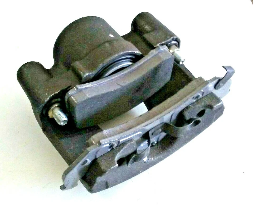 Pinza de freno de disco con pastillas de freno semimetálicas delanteras izquierda WAGNER TQM25056 Reman Foto 2 de 4