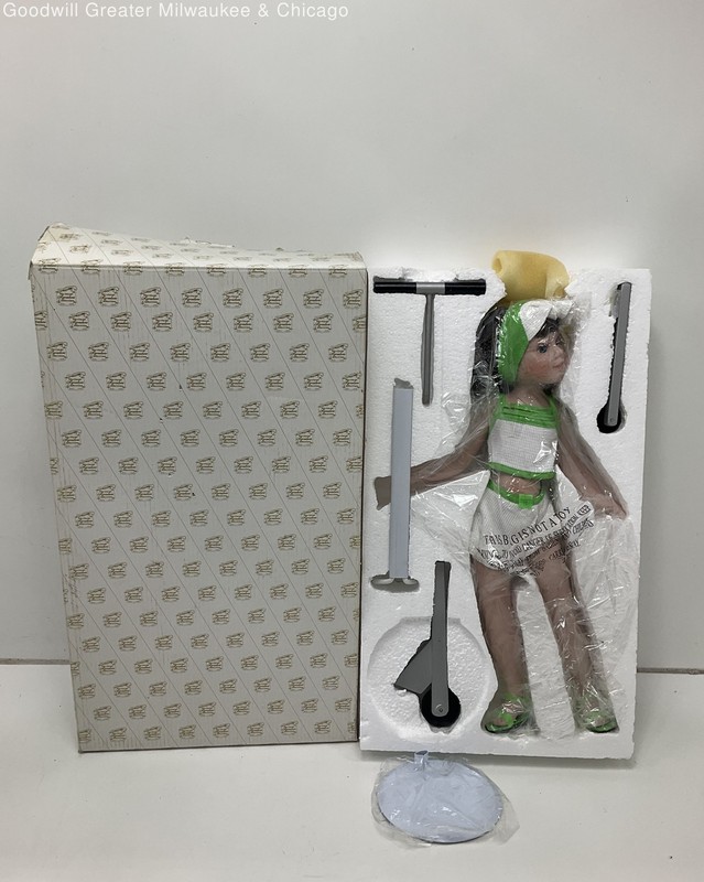 Sally Scooter Porcelain Doll